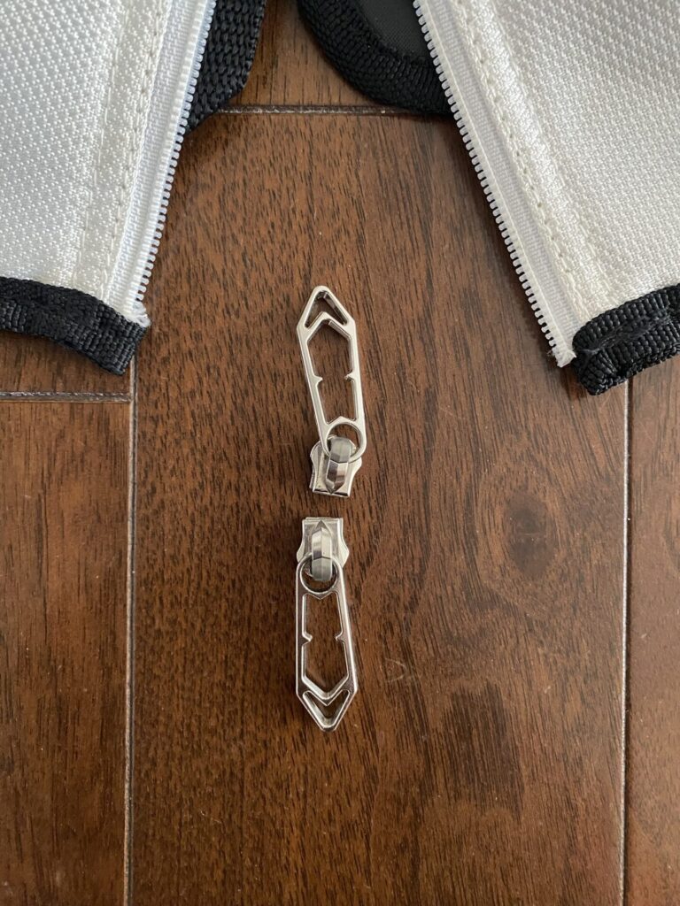 キャディバッグのフードのファスナーが故障